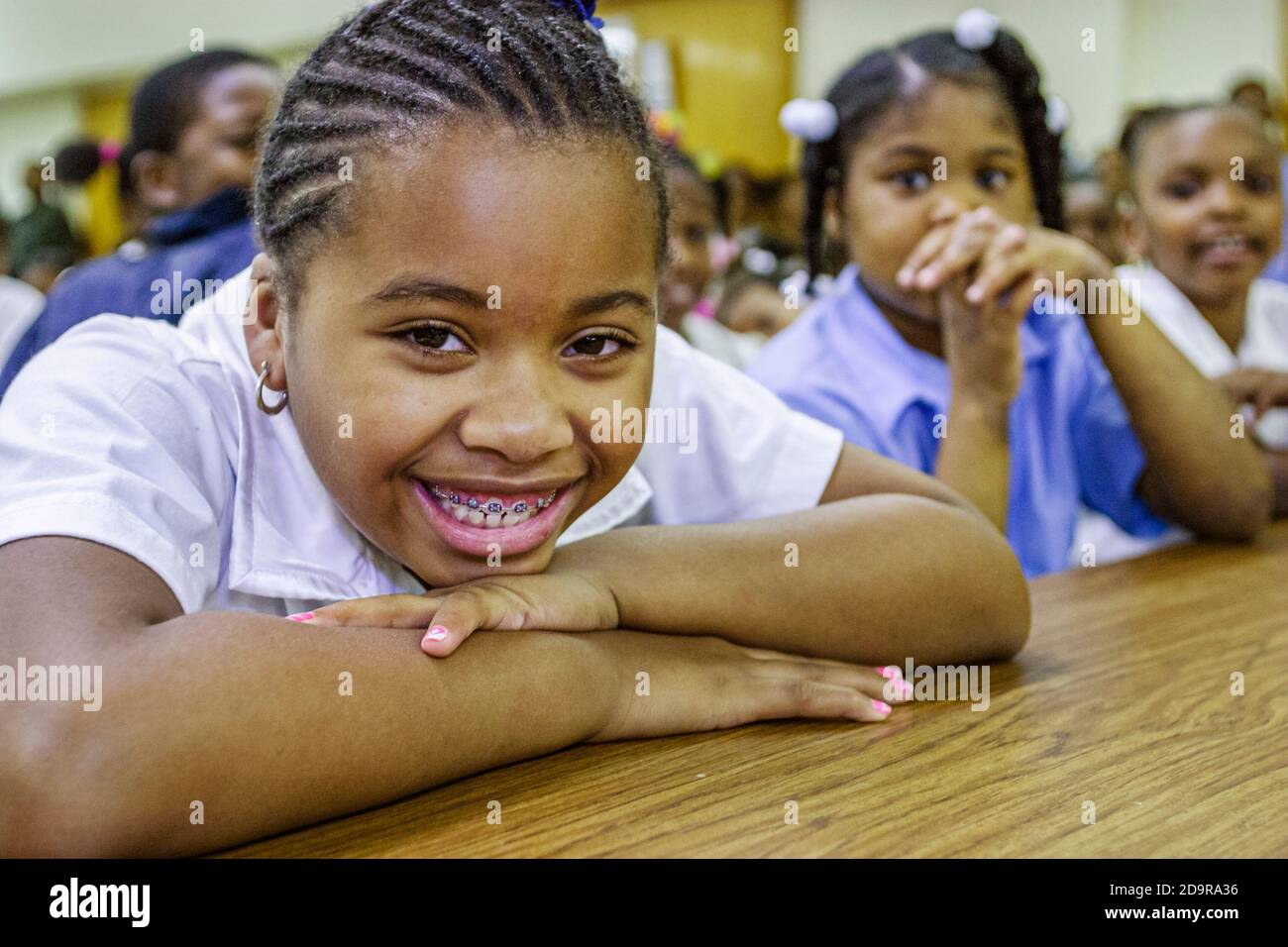 Miami Florida,Liberty City Charles Drew Elementary School,studenti Black African man,American girl female sorride, Foto Stock