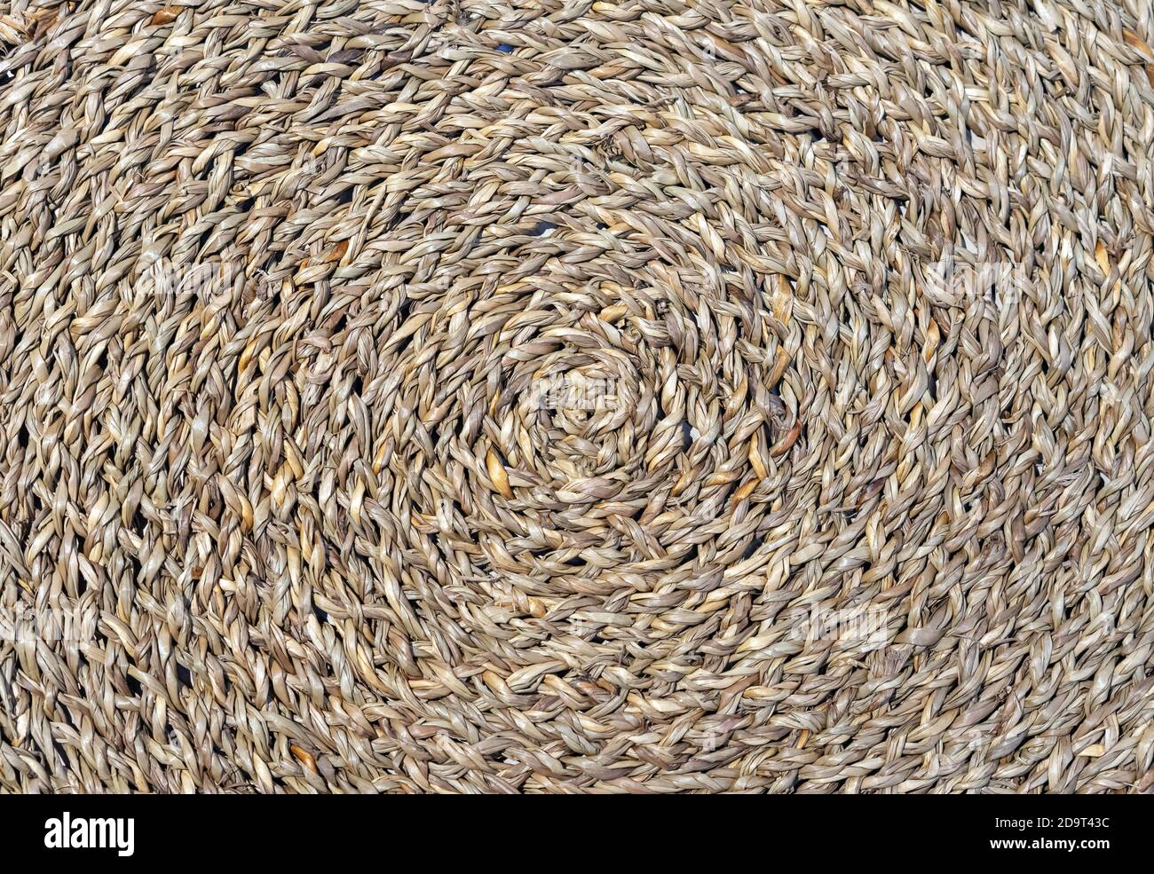 Tessuto vimini. Sfondo di tessitura di canna. Tessitura ruvida dalla paglia. Foto Stock