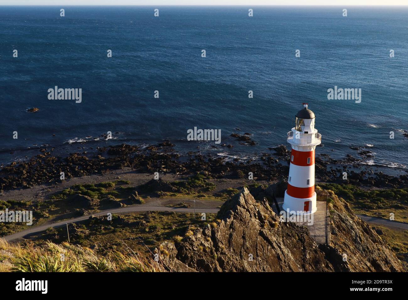 Bellissimo tramonto a Capo Palliser, faro, Isola del Nord della Nuova Zelanda Foto Stock