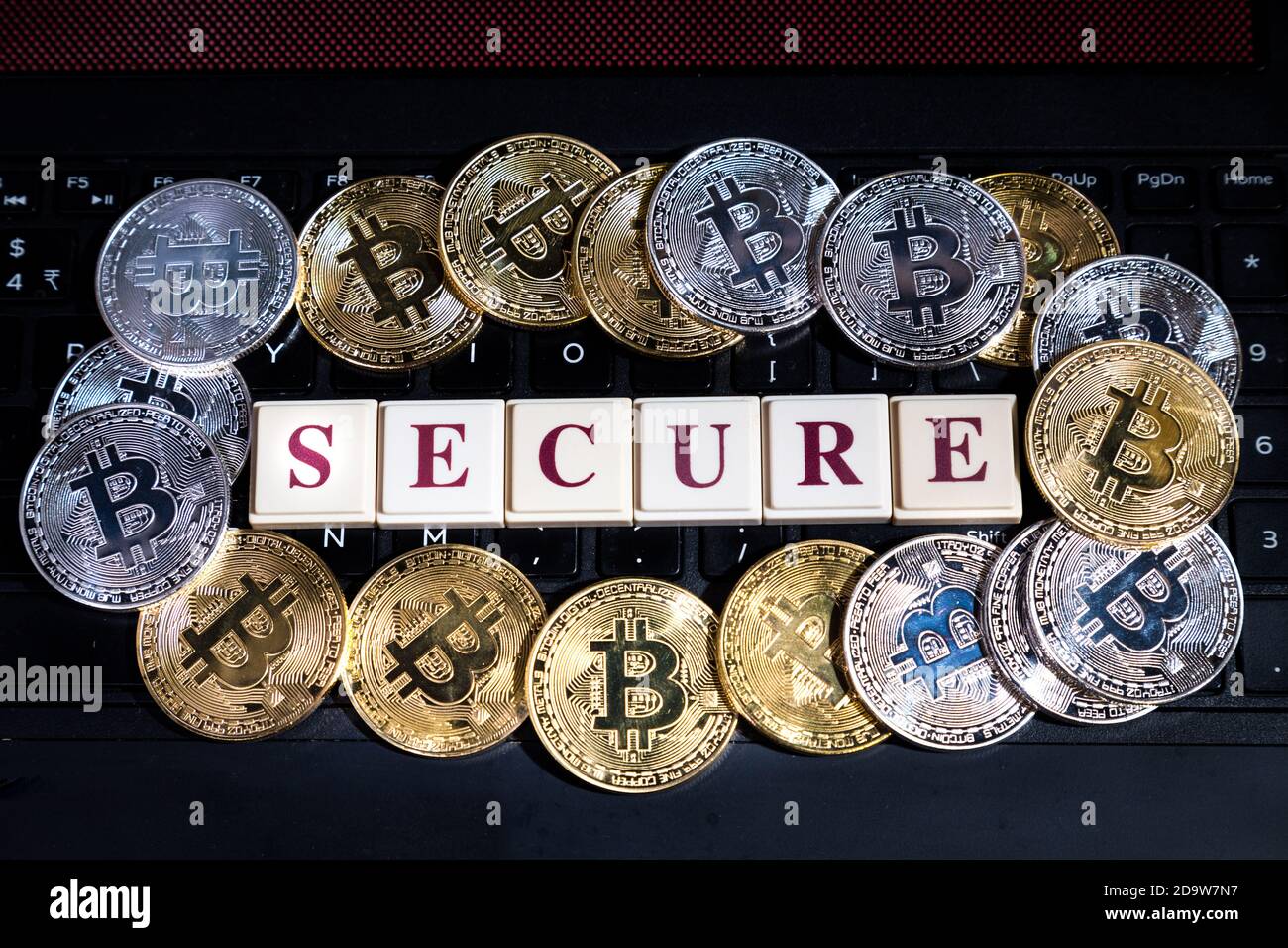 Cryptocurrency concettuale bitcoin su tastiera di computer con parola Secure Foto Stock
