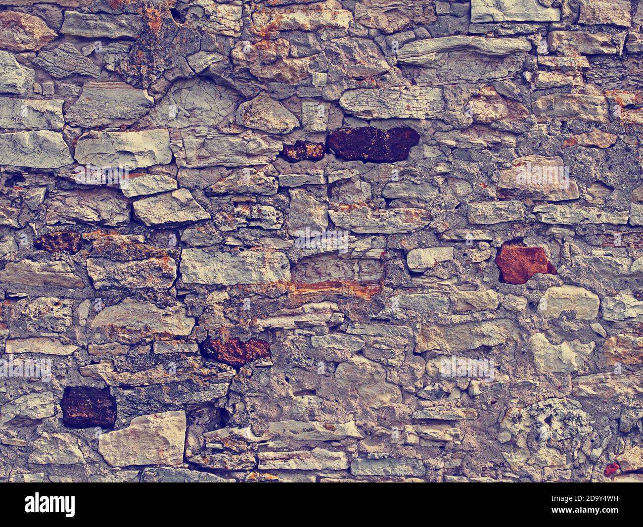 Vecchio muro di pietra di mattoni sfondo, rurale mediterraneo pietra, retrò hipster stile Foto Stock