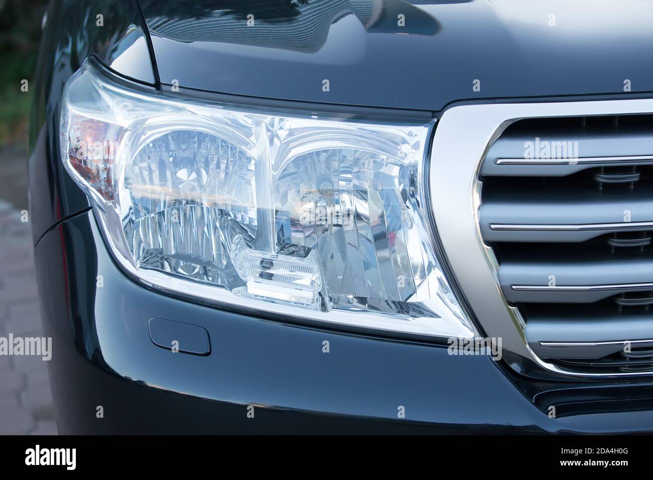 Il faro di moderne auto di prestigio closeup Foto Stock