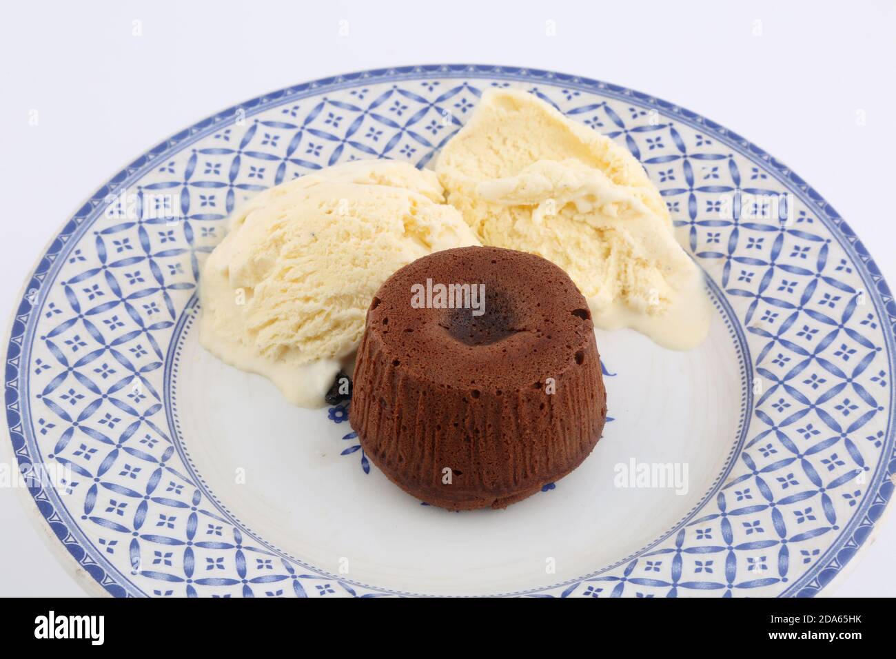 coulant al cioccolato con gelato al vanila Foto Stock