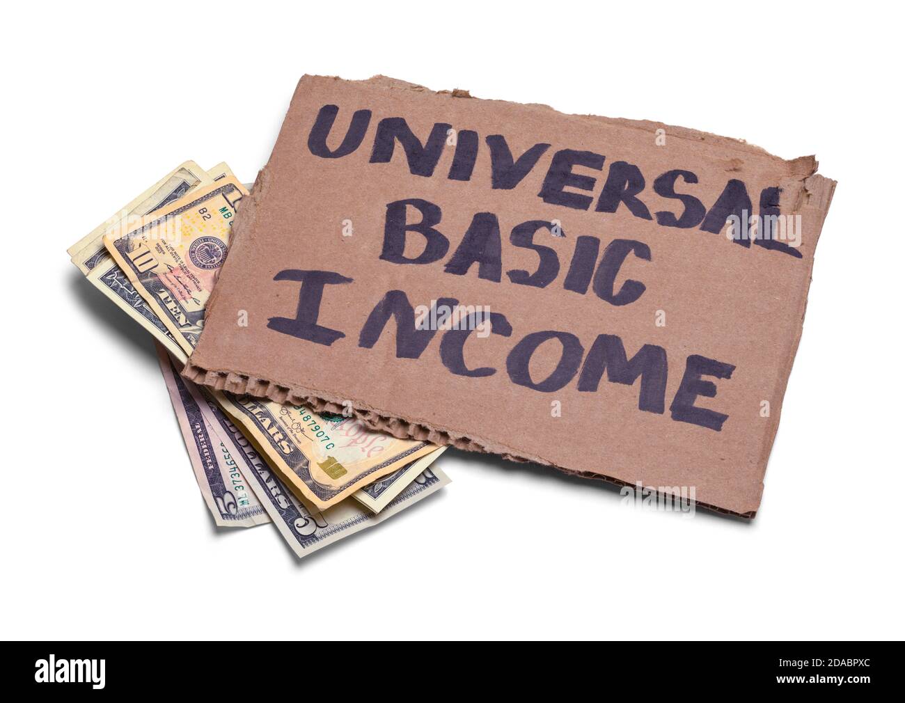 Segno di reddito di base universale con denaro contante. Foto Stock