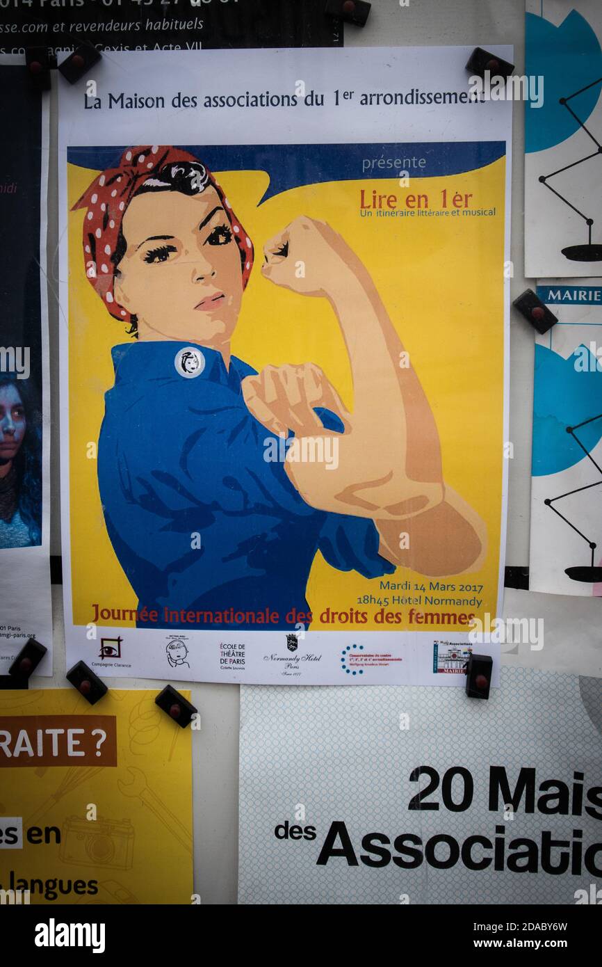 Poster con 'Rosie the Riveter' che fa pubblicità a un incontro per l'estero diritti della donna Foto Stock