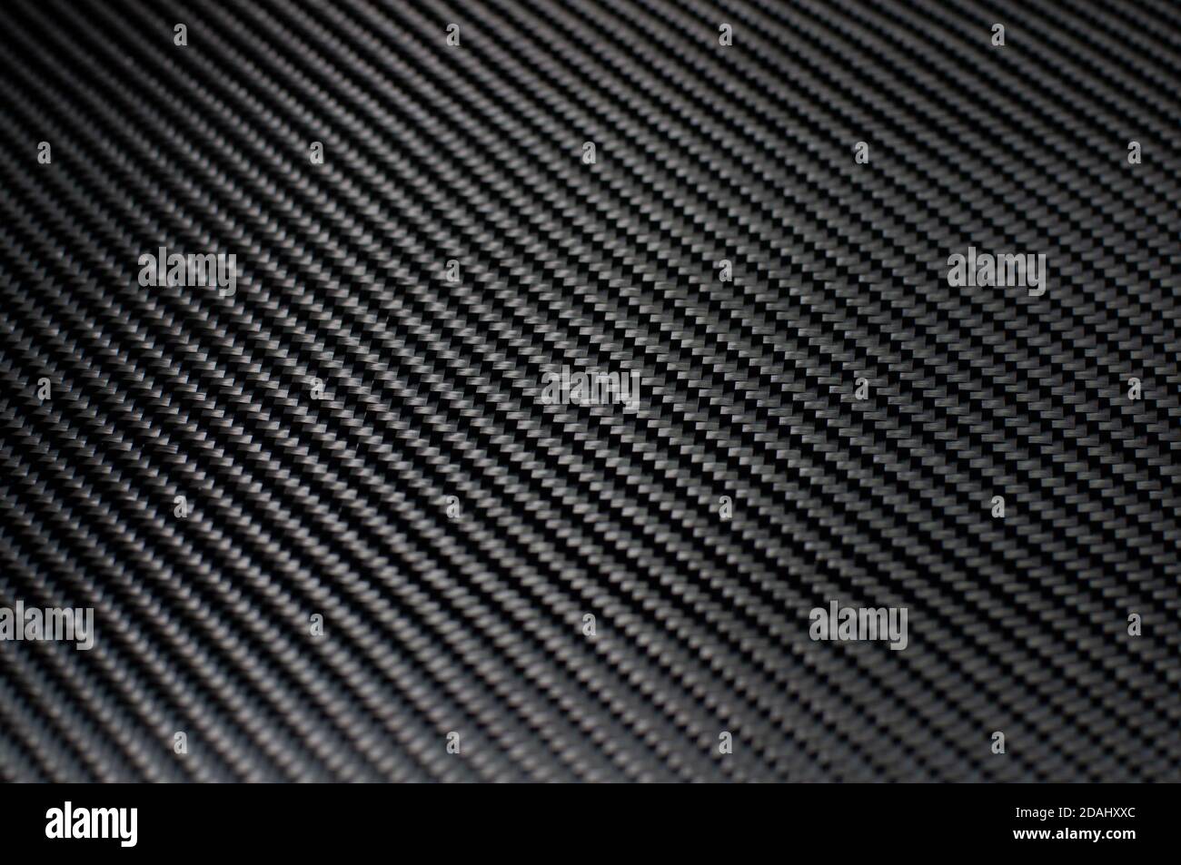 Tessuto piatto in fibra di carbonio con trama in twill reale Foto Stock