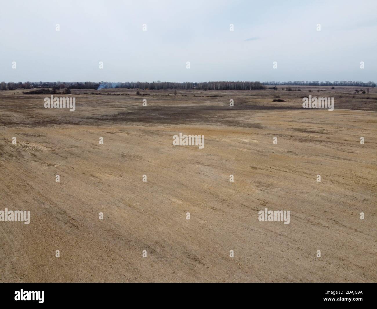 Terreno agricolo, vista aerea. Orizzontale. Campi arabili in primavera. Foto Stock