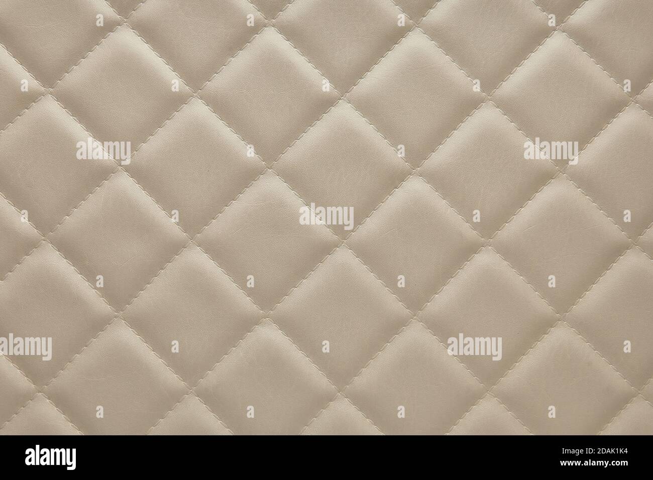 Pelle griglia beige rombo texture sfondo per l'arredamento Foto Stock