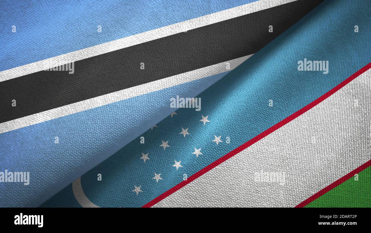 Botswana e Uzbekistan due bandiere tessuto tessuto, tessuto Foto Stock