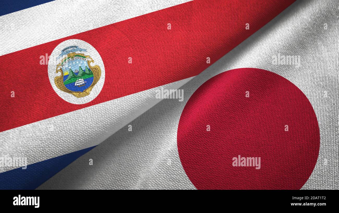 Costa Rica e Giappone due bandiere tessuto tessuto, tessuto Foto Stock