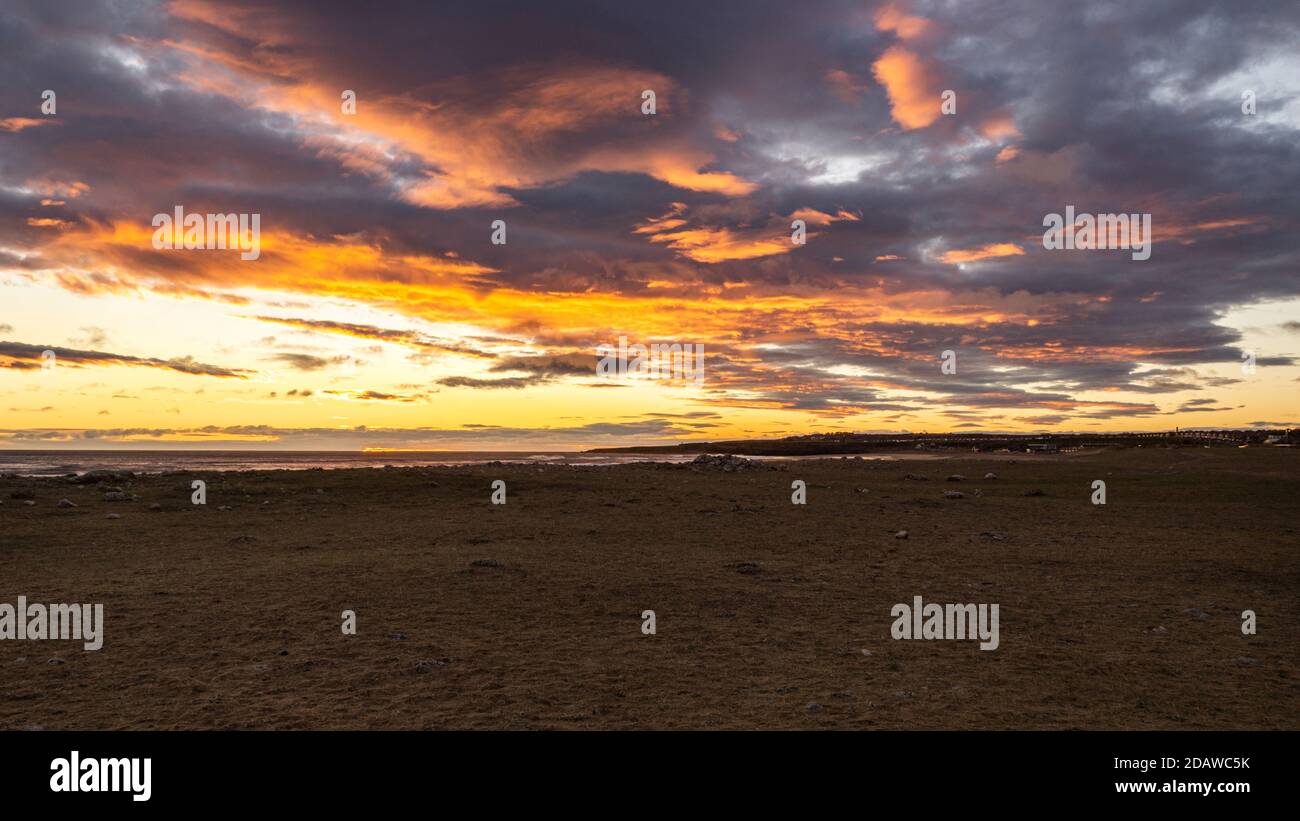 Tramonto sulla spiaggia Foto Stock