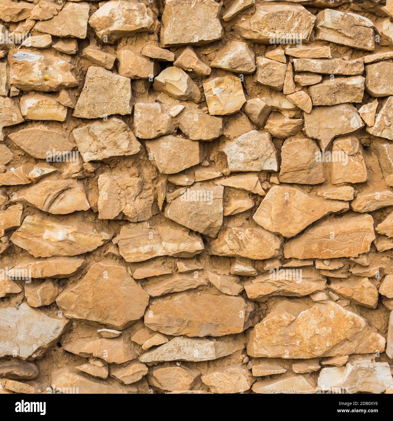 Trama astratta di sfondo di un muro di arenaria da vicino Foto Stock