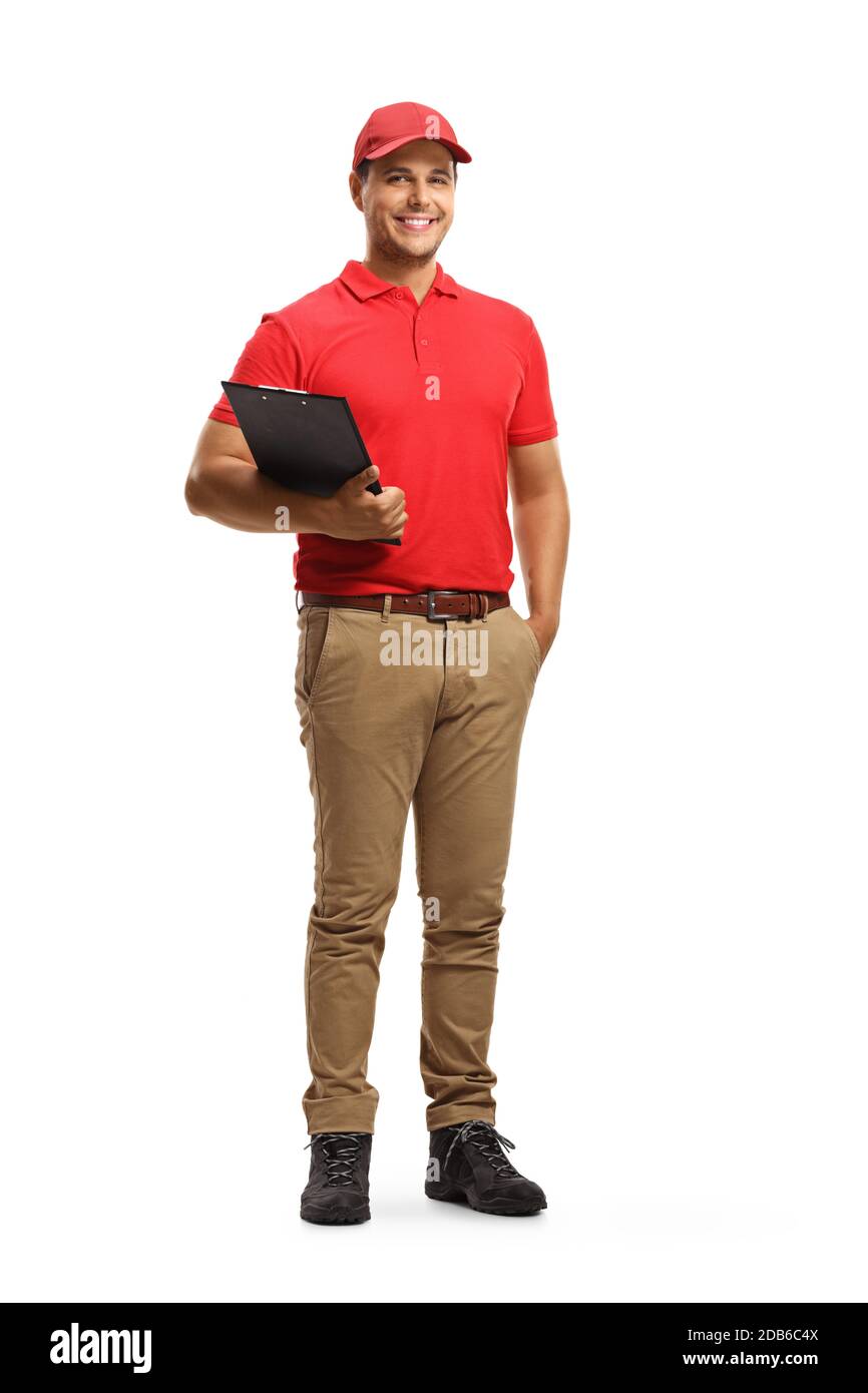 Ritratto a lunghezza intera di un uomo sorridente in uniforme tenere una clipboard isolata su sfondo bianco Foto Stock