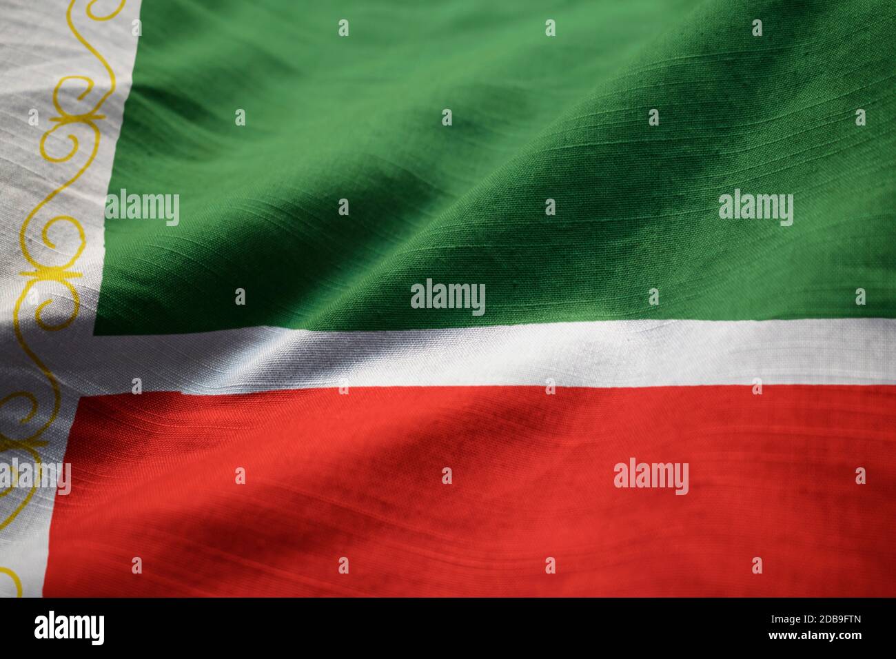 Primo piano della increspato Repubblica Cecena Bandiera, Repubblica Cecena bandiera soffiando nel vento Foto Stock