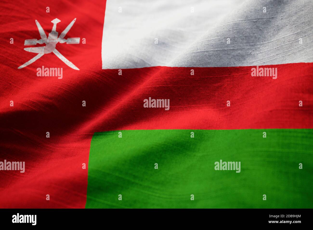 Primo piano di Ruffled Oman Flag, Oman Flag Blowing in Wind Foto Stock