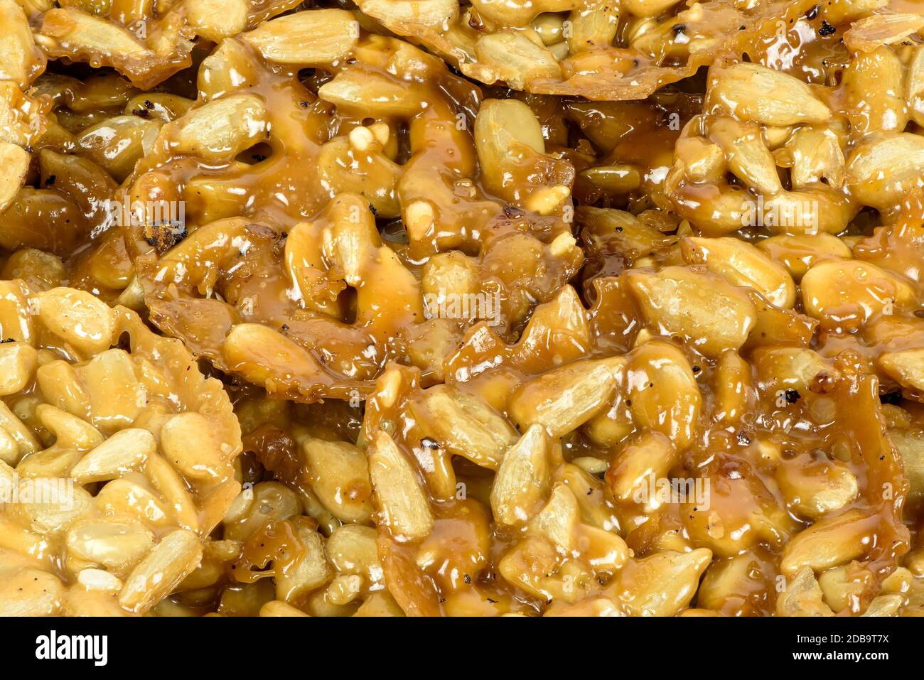 Primo piano di buiscucuits fiorentini fatti di noci, semi e miele come sfondo culinario Foto Stock