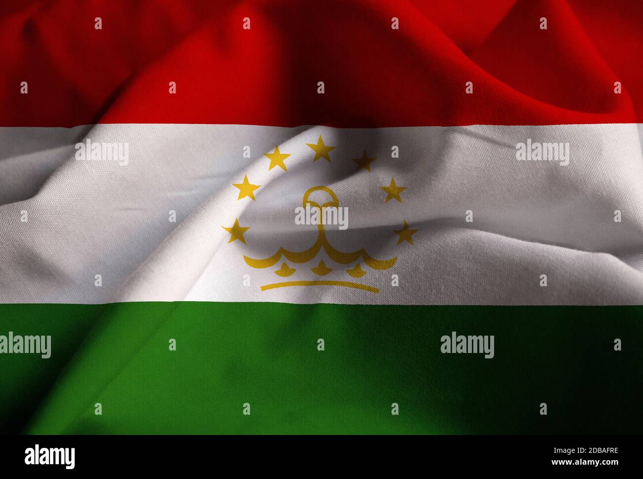 Closeup di bandiera di Tagikistan ruffled, bandiera di Tagikistan che soffia nel vento Foto Stock