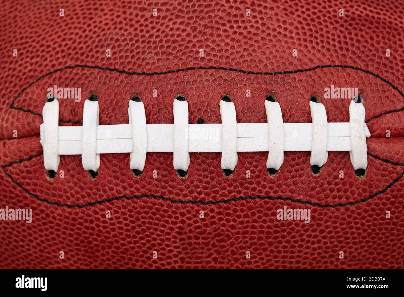 Primo piano di lacci sul pallone da calcio americano Foto Stock