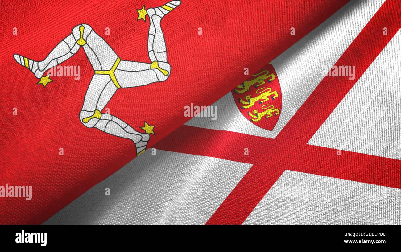 Isle of Mann e Jersey due bandiere tessuto tessuto, tessuto Foto Stock
