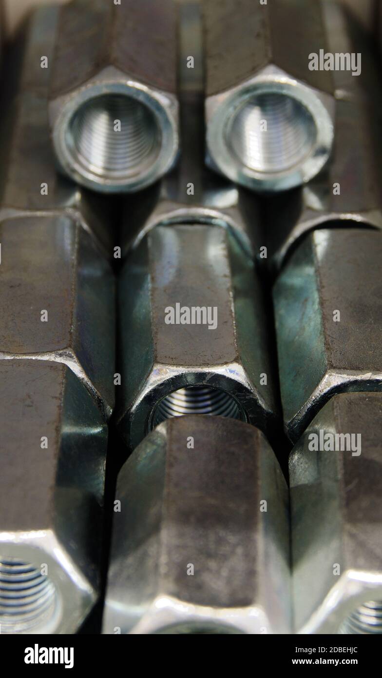 Manicotti filettati esagonali zincati Foto Stock