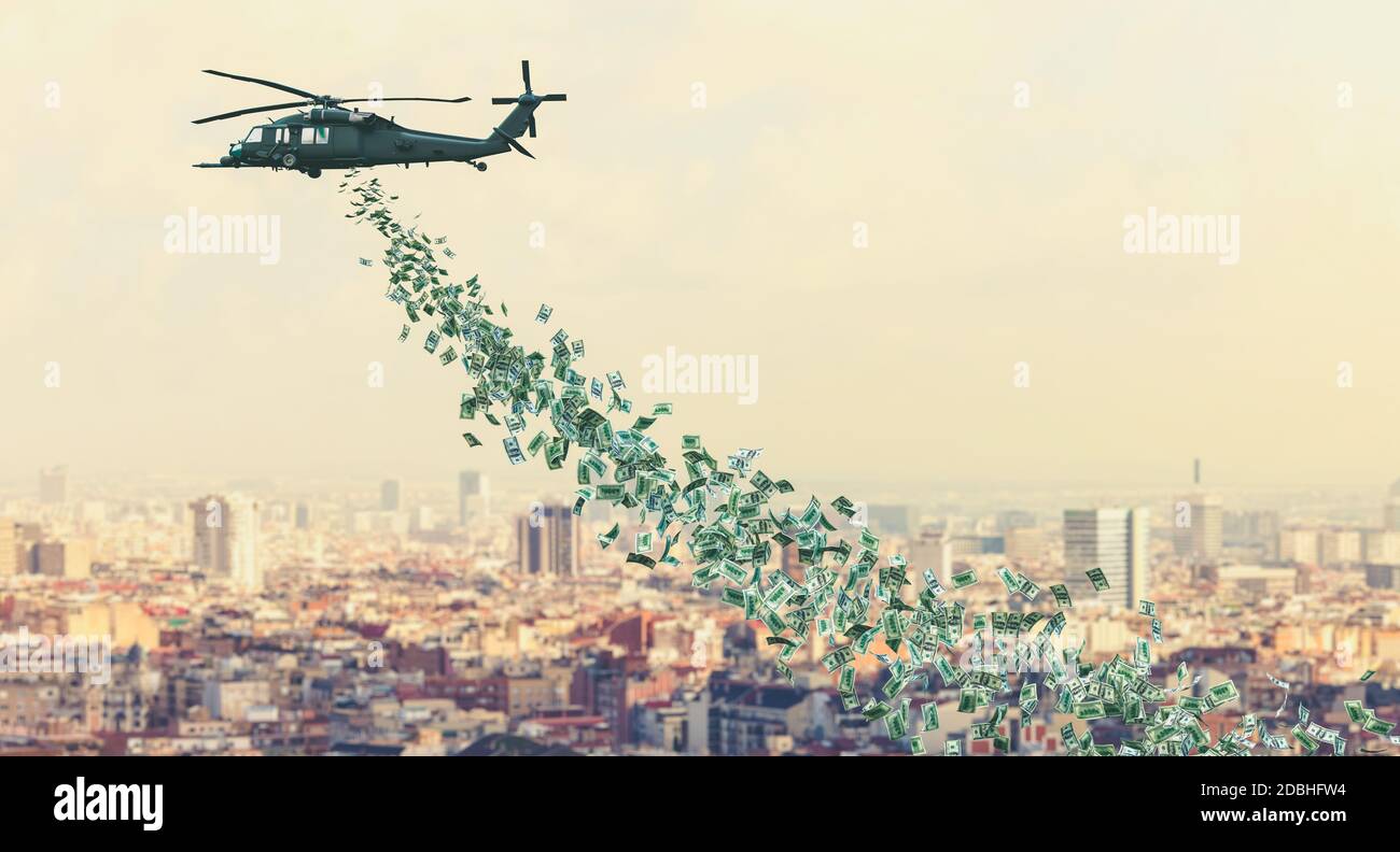 l'elicottero vola sulla città e distribuisce denaro a tutti. Concetto di denaro per elicotteri. Aiuto finanziario in tempi di crisi coronavirus covid Foto Stock