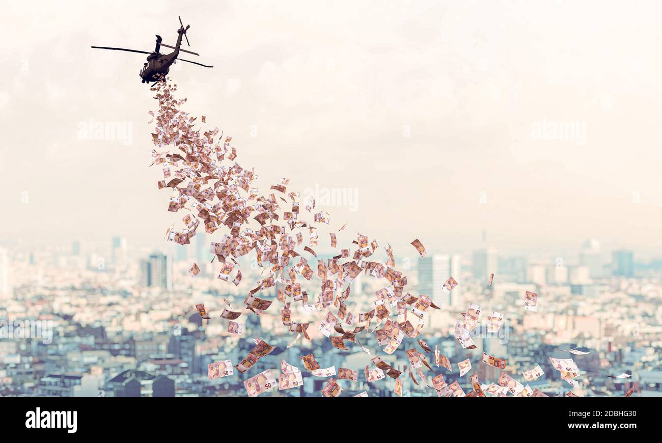 l'elicottero sorvola la città e distribuisce denaro in euro a tutti. Concetto di denaro per elicotteri. Aiuto finanziario in tempi di crisi coronavirus covid 19 Foto Stock
