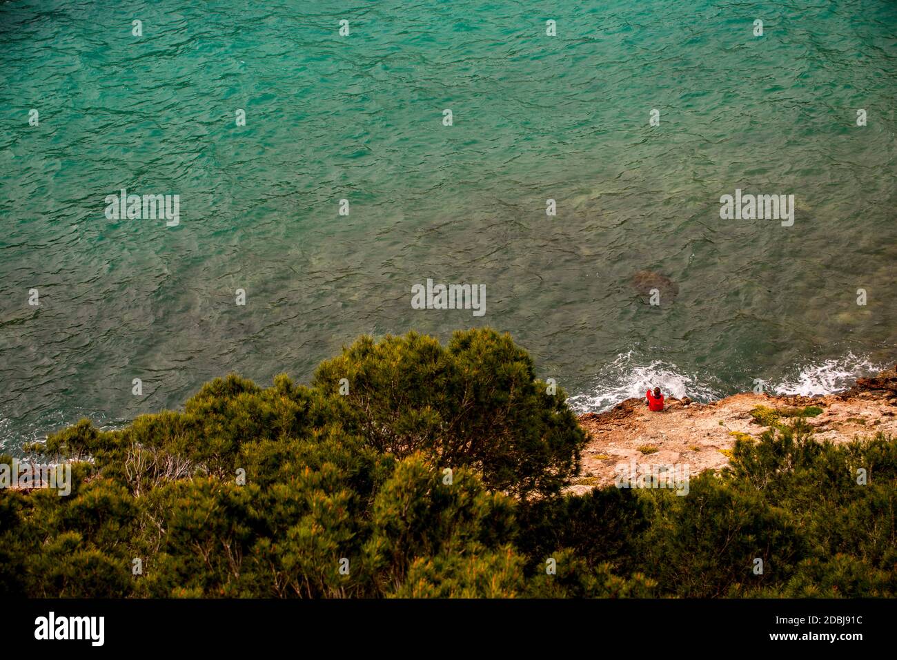 Bambini a Calao Llonga Beach Foto Stock