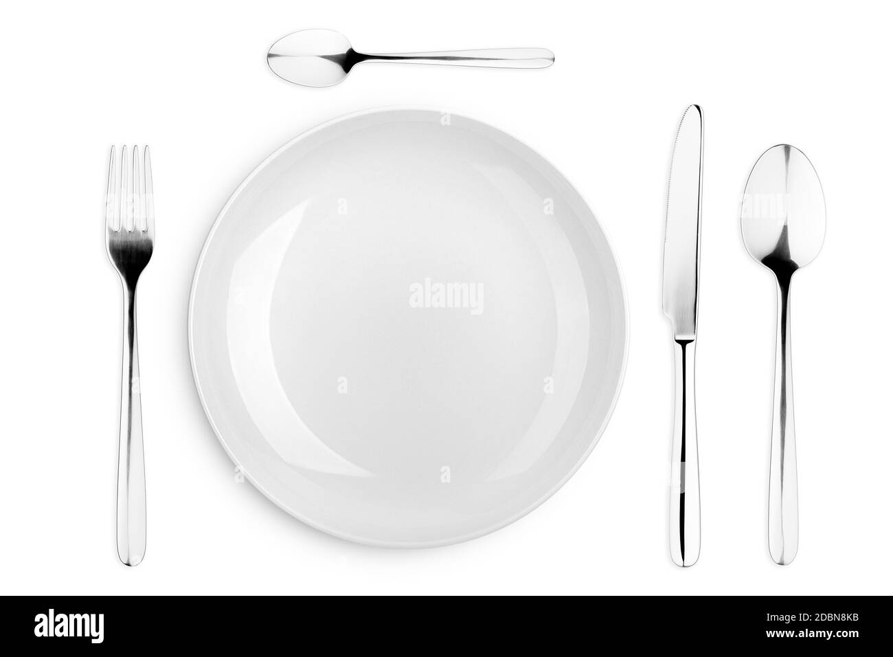 Piastra vuota, cucchiaio, cucchiaino da tè, forchetta, coltello, percorso di ritaglio, sfondo bianco, isolato, vista dall'alto Foto Stock