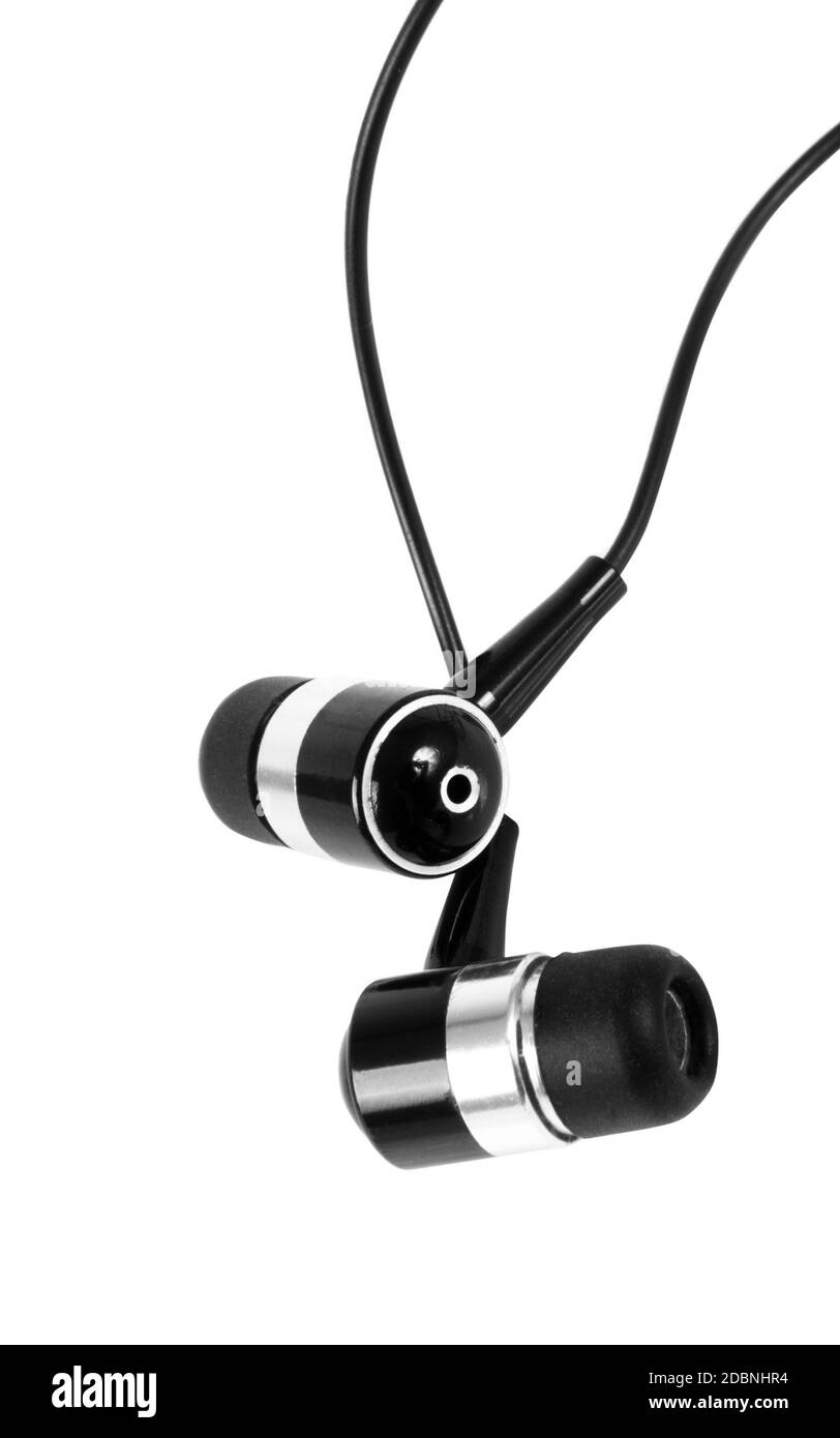 Auricolari gemme sulla superficie bianca Foto Stock