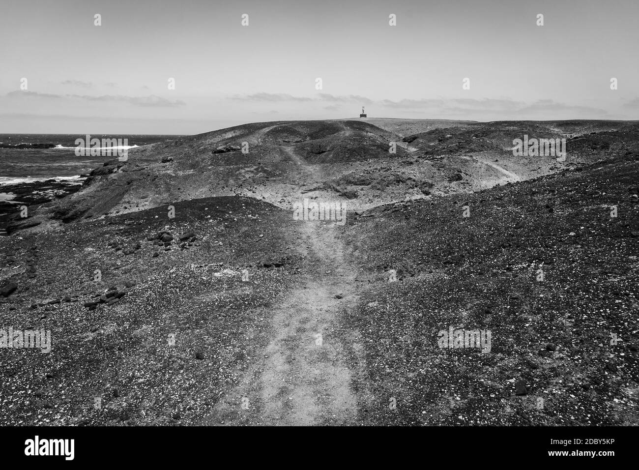 Paesaggio naturale. Le distese rocciose e desertiche della Penisola di Jandia. Fuerteventura. Isole Canarie. Spagna. Bianco e nero. Foto Stock