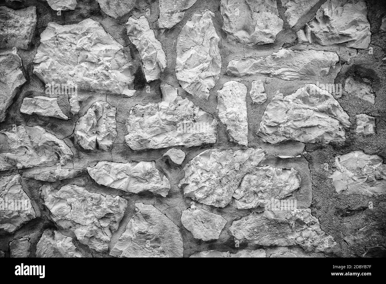 Fondo in pietra testurizzata, dettaglio di parete decorata con marmo Foto Stock