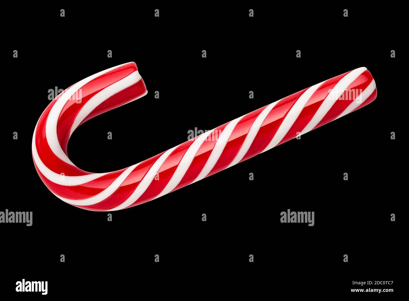 Canne caramelle classiche - regalo di Natale. San Nicola giorno dolcezza su sfondo nero Foto Stock