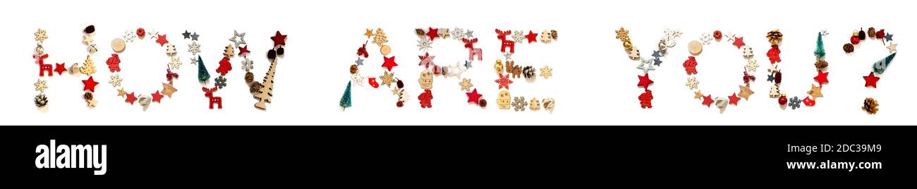 Colorful Natale decorazione lettera costruzione parola inglese come siete. Ornamento festivo come albero di Natale, stella e palla. Sfondo bianco isolato Foto Stock