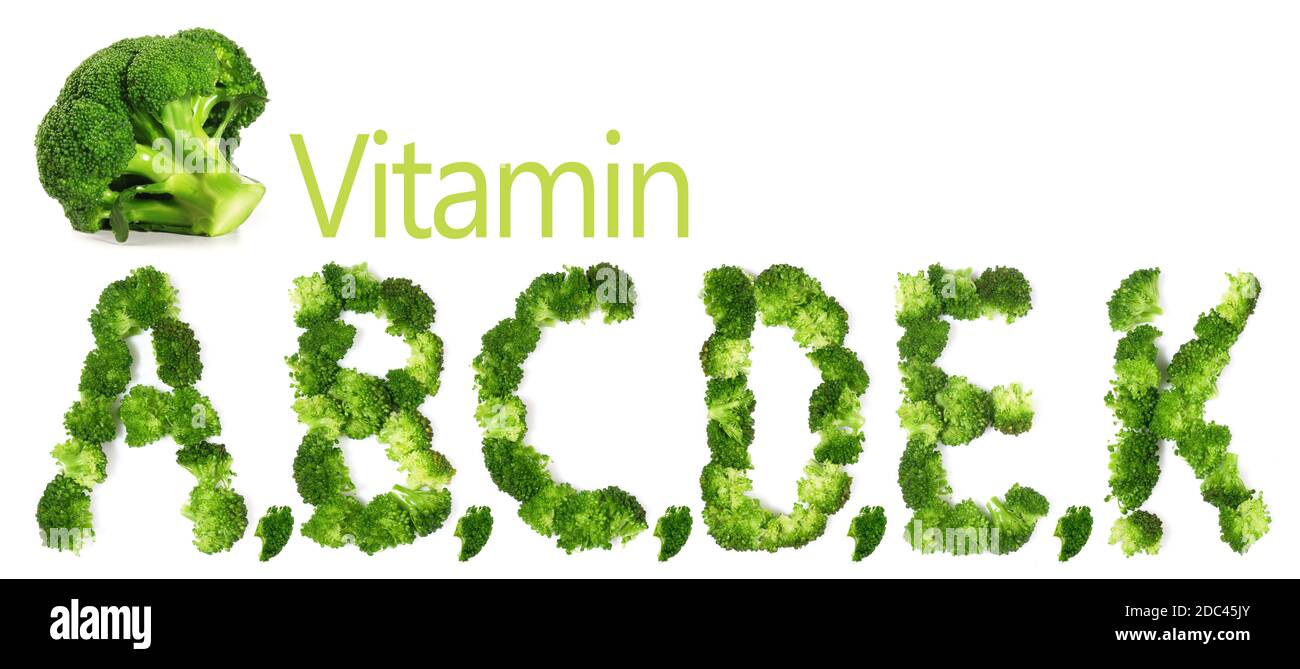 Lettere di broccoli e vitamine isolate su sfondo bianco Foto Stock