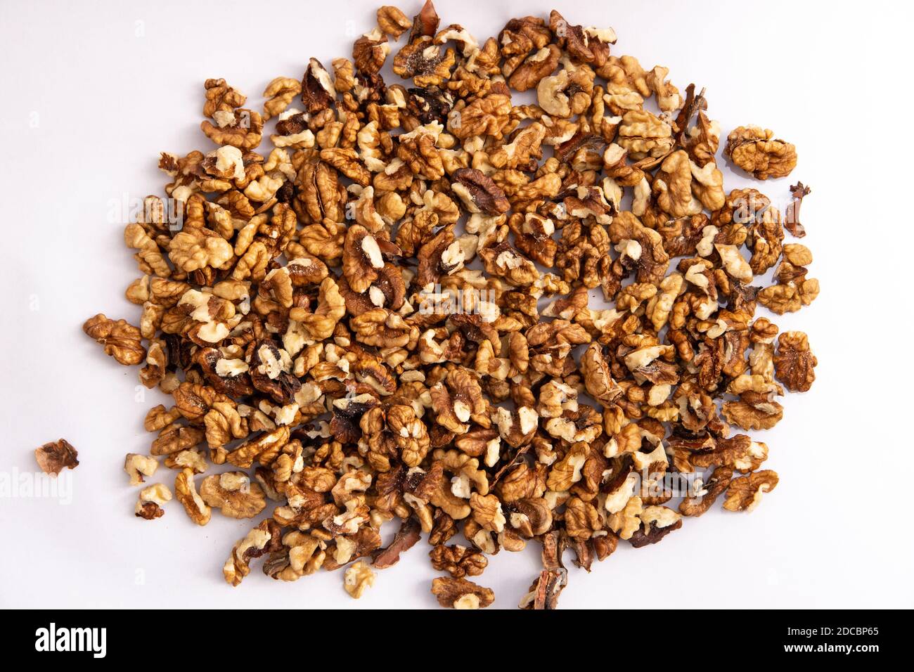 Pila isolata di noci di fondo Foto Stock