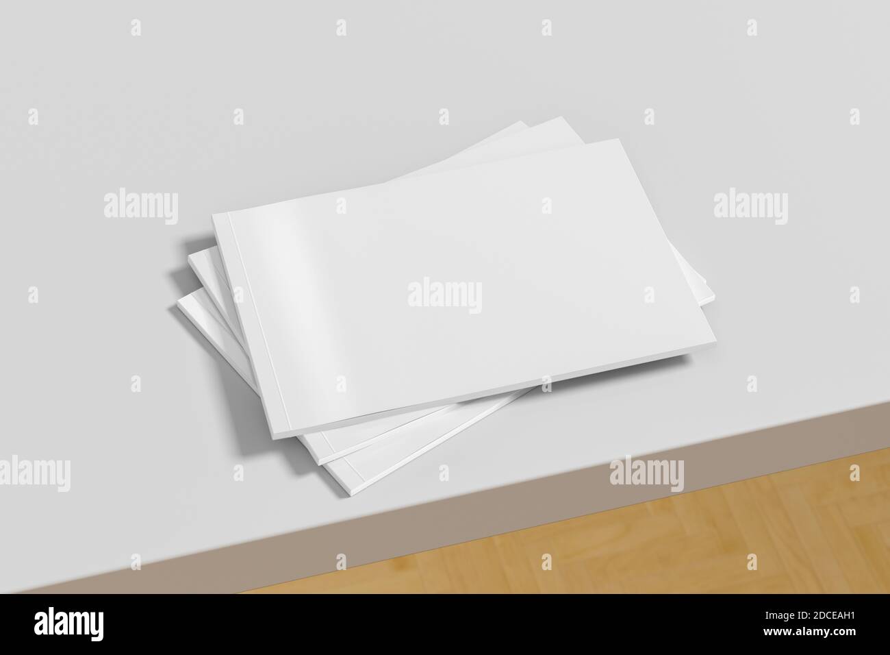 Mockup orizzontale o orizzontale di riviste bianche o brochure su un tavolo bianco Foto Stock