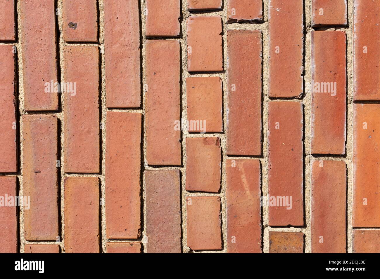 Sfondo/trama verticale esterno della parete in mattoni Foto Stock