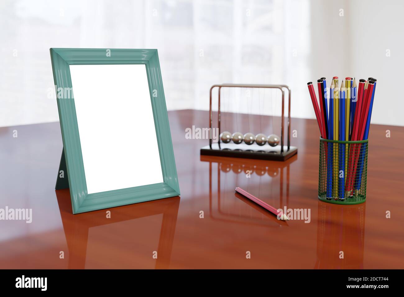 Cornice su una scrivania accanto ad alcune matite e oggetti da ufficio. illustrazione 3d. Foto Stock