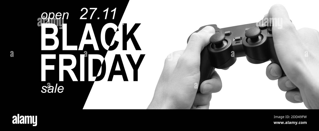 Giocatore che tiene il joystick del controller sulle mani e gioca con sfondo schermo del laptop, concetto di e-sport, testo di sfondo bianco e nero venerdì Foto Stock