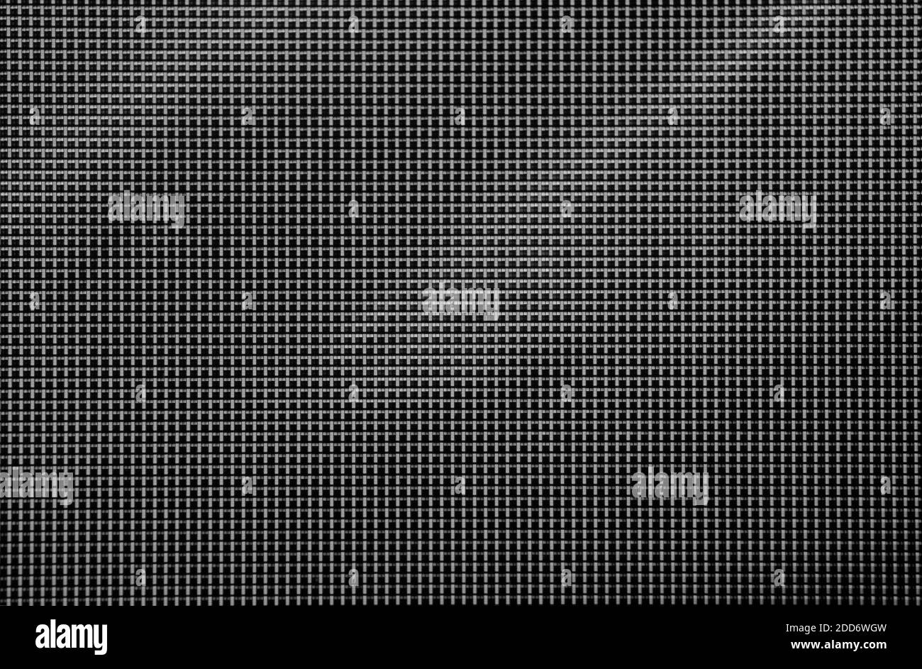 Pixel nella scala macro dello schermo a cristalli liquidi. Sfondo texture schermo parete video. Grigio con alcuni gradienti diagonali Foto Stock