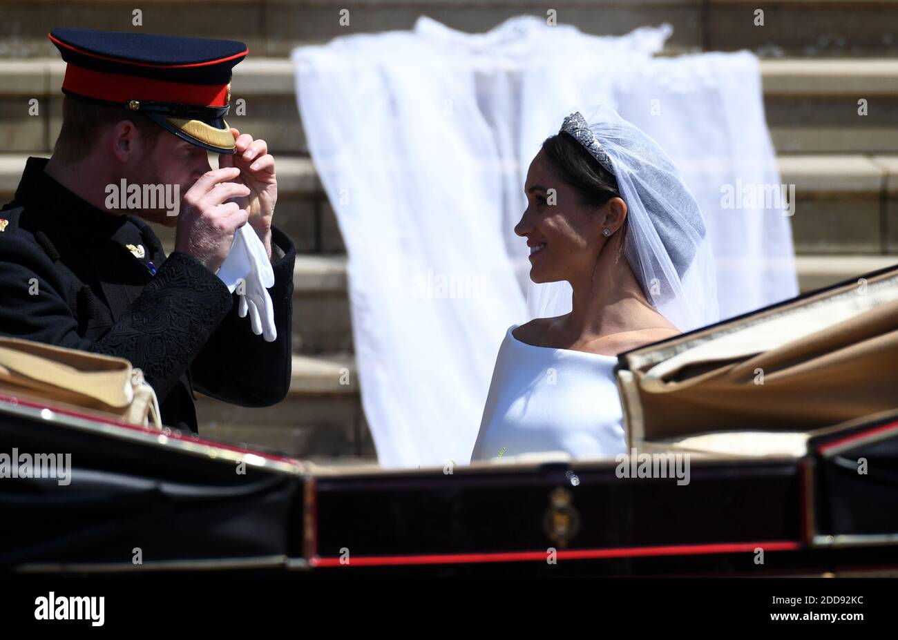 Il Principe della Gran Bretagna Harry (L), Duca di Sussex e Meghan (R), Duchessa di Sussex, partiranno dalla Cappella di San Giorgio nel Castello di Windsor dopo la cerimonia di matrimonio reale, a Windsor, in Gran Bretagna, il 19 maggio 2018. Alla coppia sono stati conferiti i titoli reali di Duca e Duchessa di Sussex dal monarca britannico. Foto di Neil Hall / ABACAPRESS.COM Foto Stock