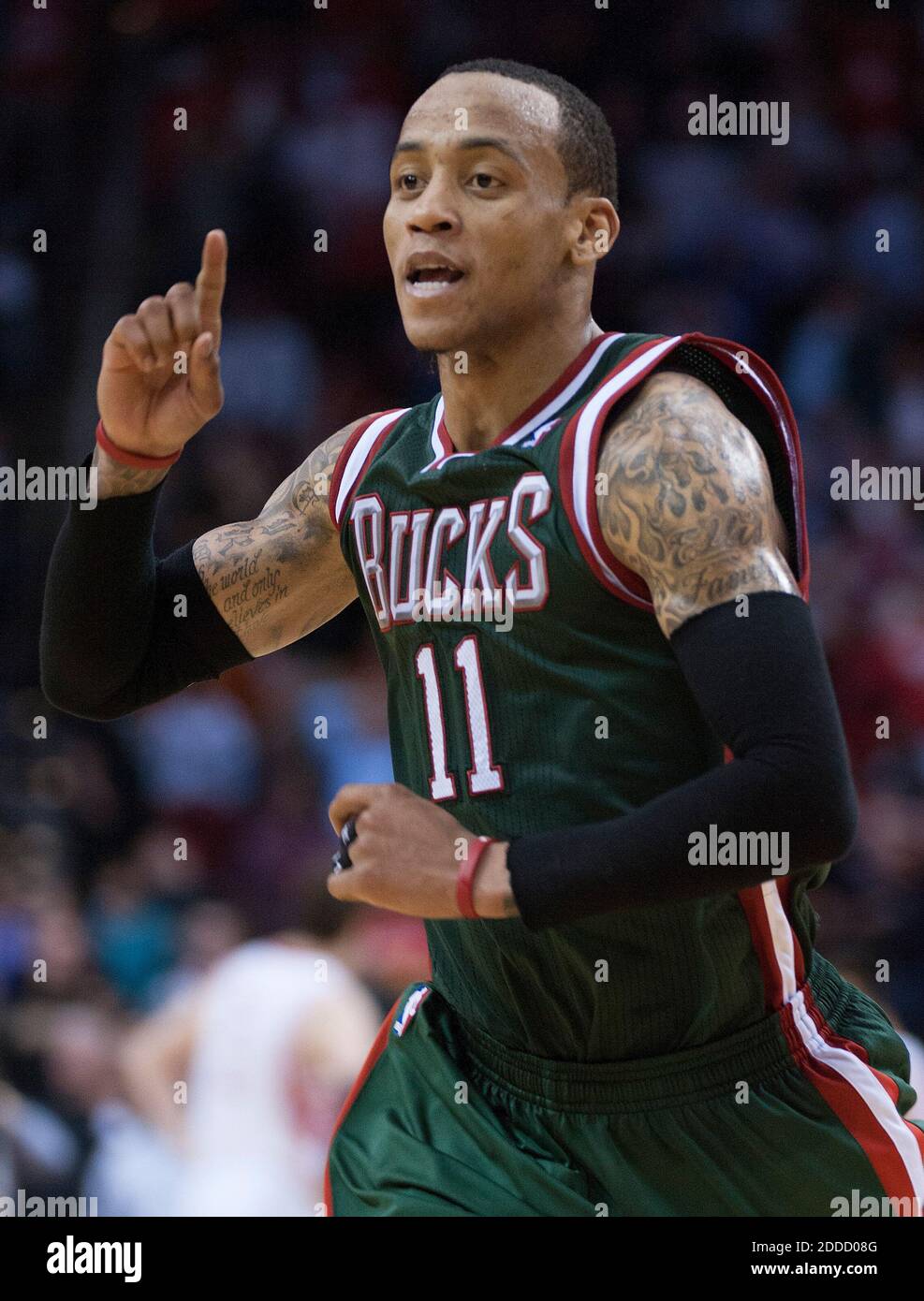 NESSUN FILM, NESSUN VIDEO, NESSUNA TV, NESSUN DOCUMENTARIO - Manta Ellis (11) dei Milwaukee Bucks festeggia mentre corre fuori dal campo dopo aver colpito il colpo vincitore del gioco al buzzer in una vittoria di Buck 110-107 sopra gli Houston Rockets a Houston, TX, USA il 27 febbraio 2013. Foto di George Bridges/MCT/ABACAPRESS.COM Foto Stock