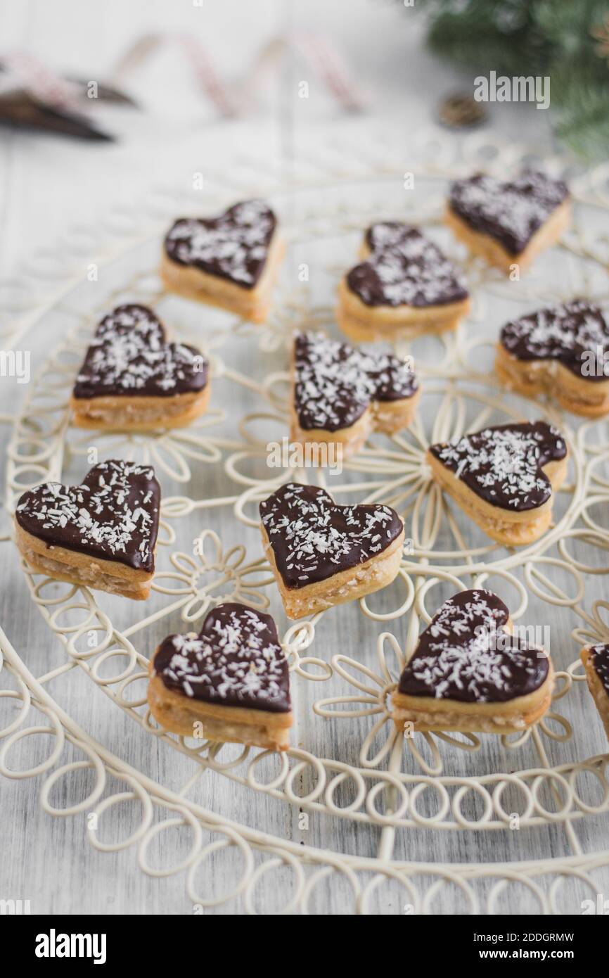 Biscotti di Natale di cuori di cocco Foto Stock