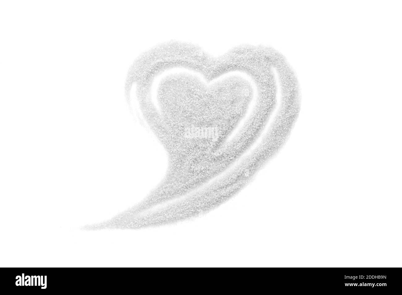 Zucchero bianco a forma di cuore macchia isolato su sfondo bianco. Foto Stock