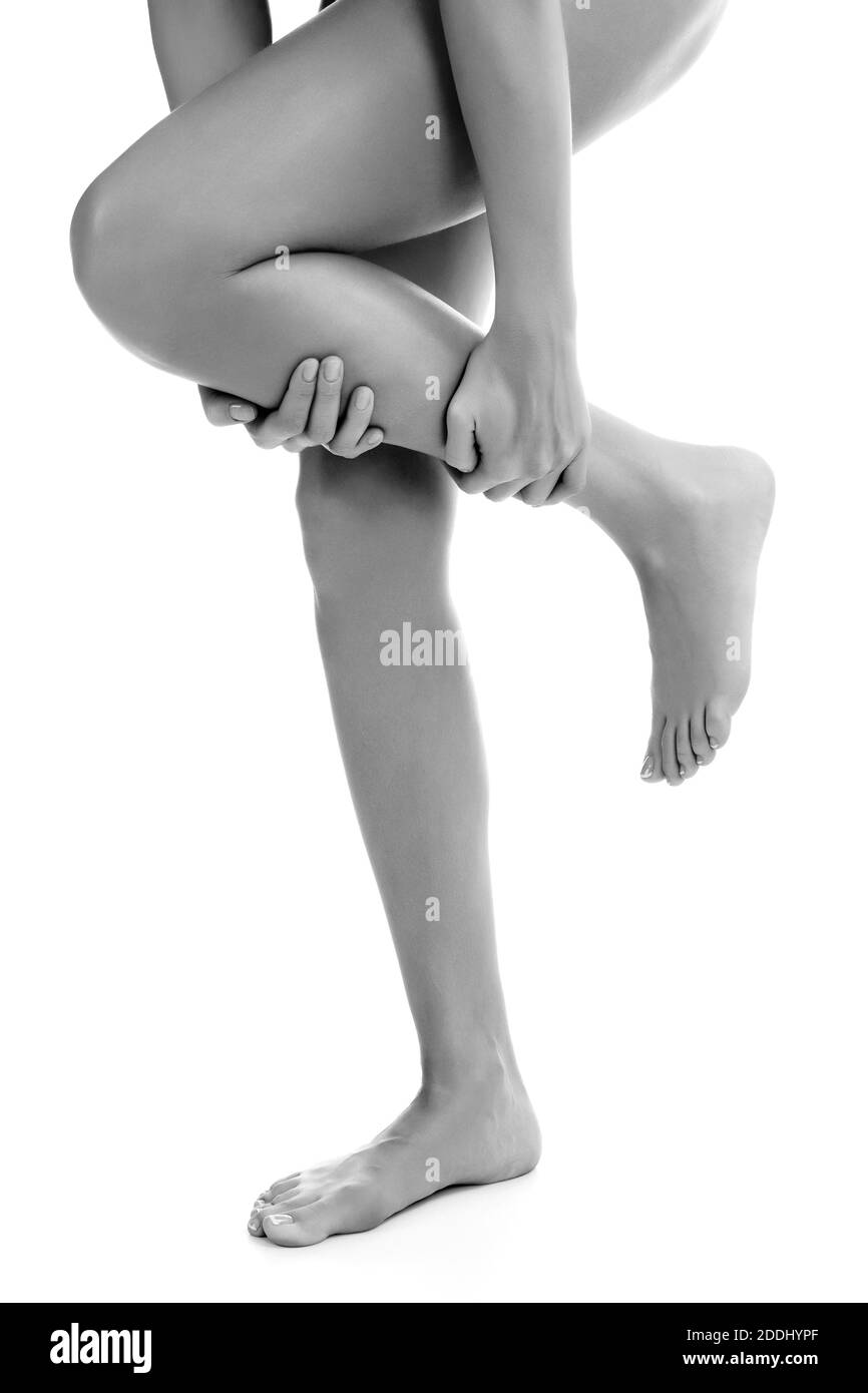 Dolore alla gamba, isolato su sfondo bianco Foto Stock