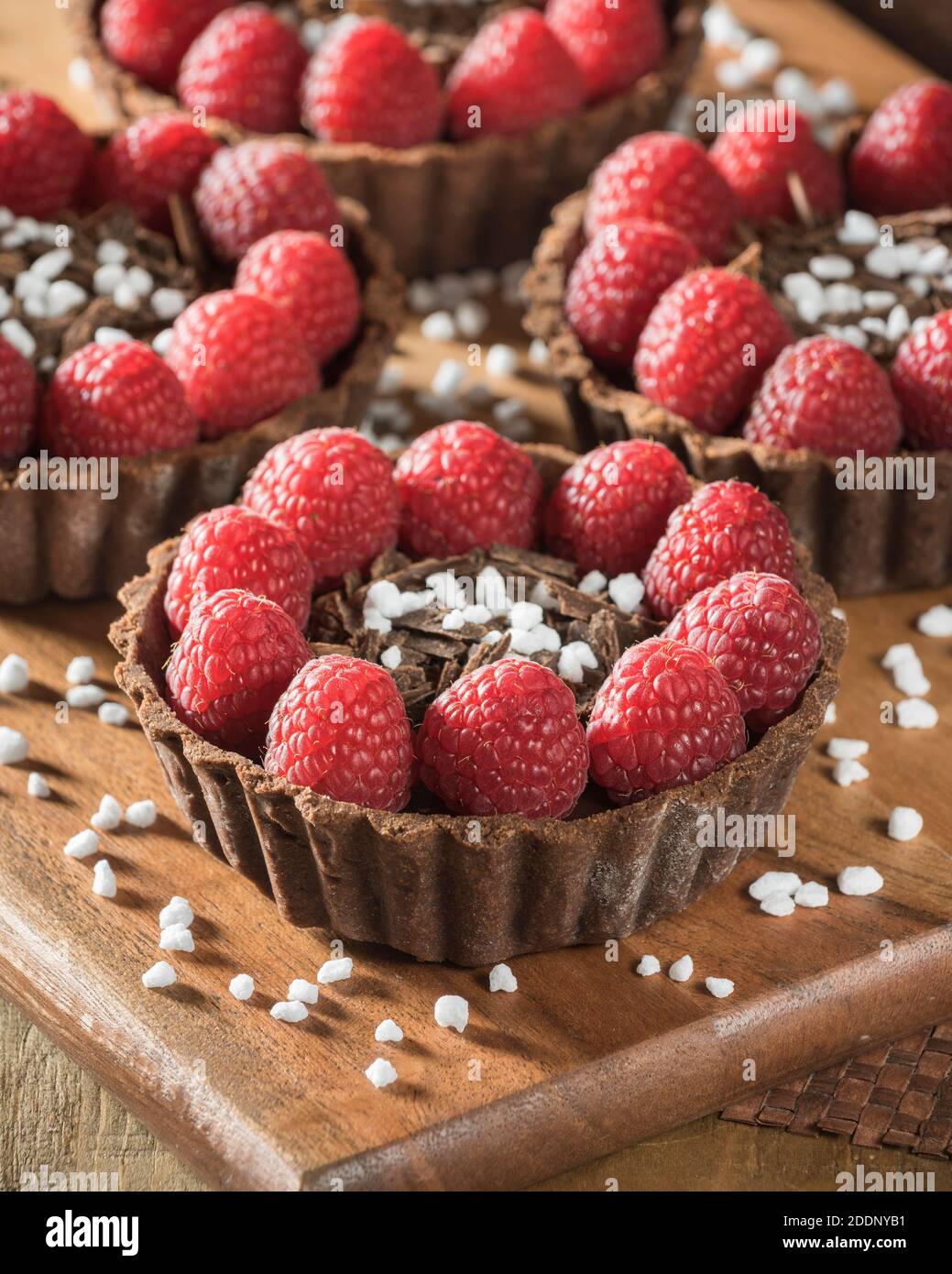 Crostate di cioccolato e lamponi Foto Stock