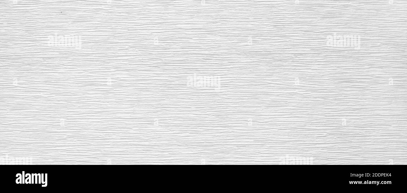 Foto di qualità di una bella parete a strisce, frammento di dettagli di una superficie in pietra testurizzata. Foto Stock