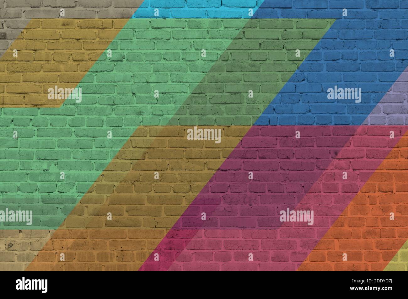 Muro di mattoni verniciato con vernici multicolore. Sfondo astratto. Il vecchio muro. Foto Stock