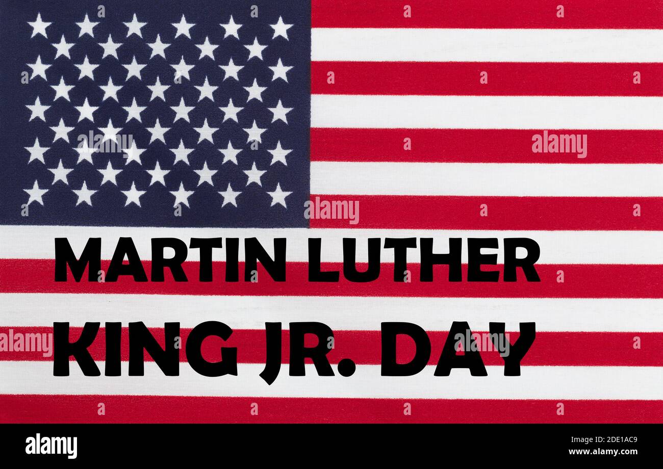 Happy Martin Luther King JR giorno sfondo con lettere e. Bandiera degli Stati Uniti Foto Stock