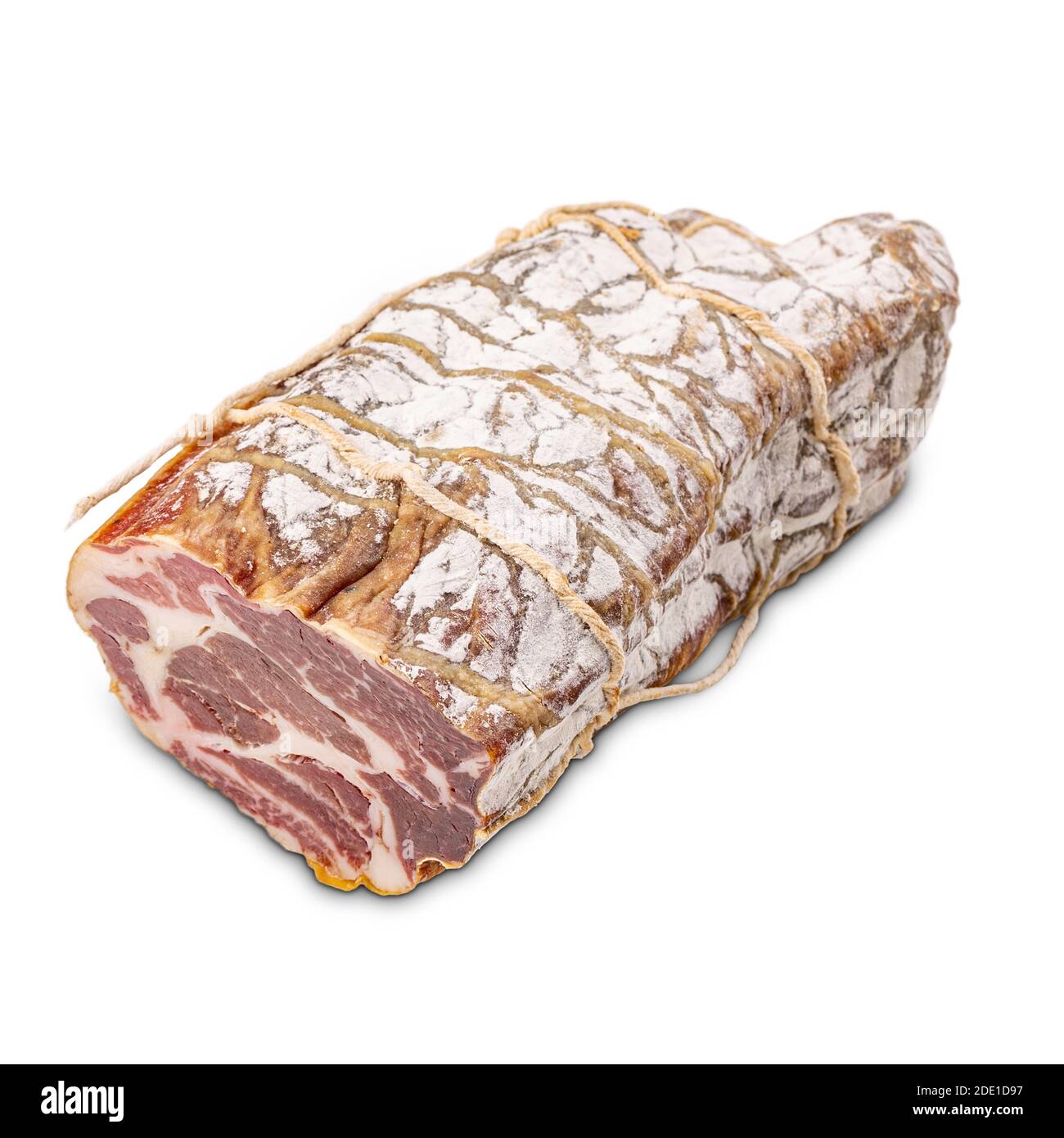 Coppa di Parma intera su fondo bianco Foto Stock